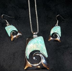 Iridescent silver necklace and earring spiral circle of life symbol